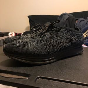 Men’s Nike “FlyKnit Racer” Black size 10.5